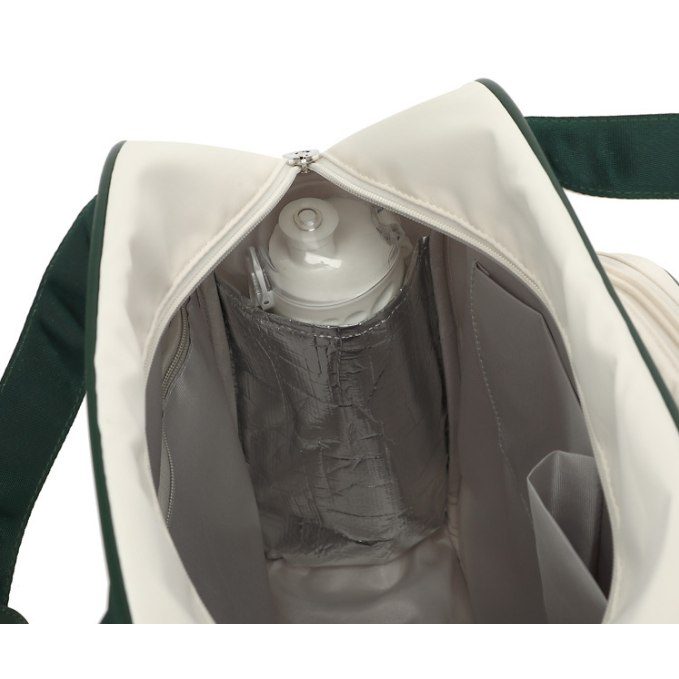 Colour-block racket bag — main compartment interior with bottle pocket